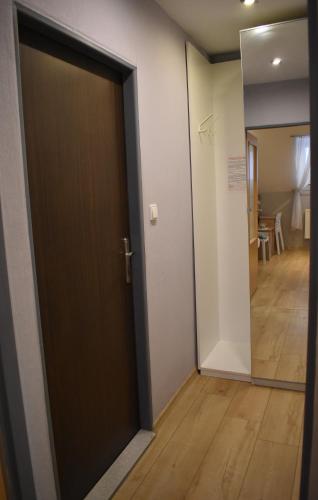 a door leading into a room with a hallway at Hotel Boršičanka in Havířov
