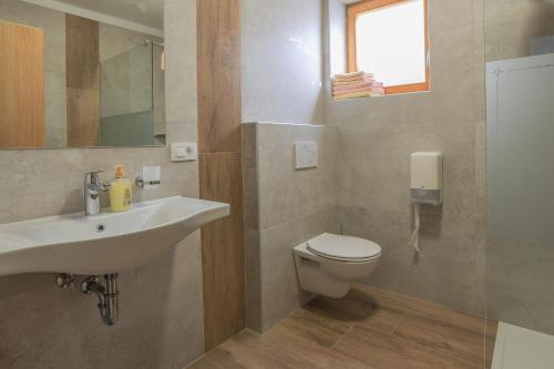 Un baño de Apartments Mulej