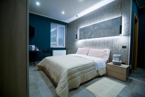 מיטה או מיטות בחדר ב-Baku