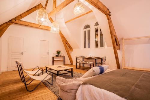 Postel nebo postele na pokoji v ubytování Maison Cachée - Chambres et Appartements en Baie de Somme
