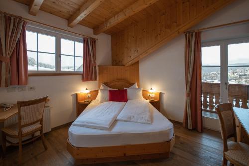 Postel nebo postele na pokoji v ubytování Cristallo B&B