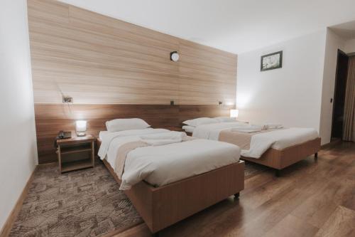 Katil atau katil-katil dalam bilik di Hotel Apollo Central