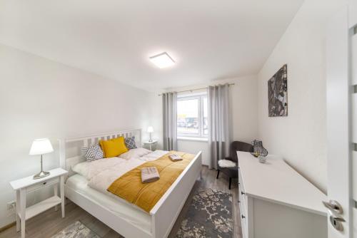 Ένα ή περισσότερα κρεβάτια σε δωμάτιο στο Tower Apartments