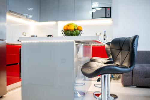 Kuchyň nebo kuchyňský kout v ubytování Sebastian Luxury Apartments