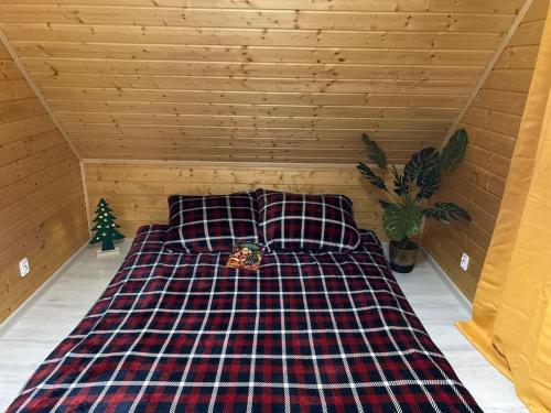 Postel nebo postele na pokoji v ubytování Dom Małe Mazury