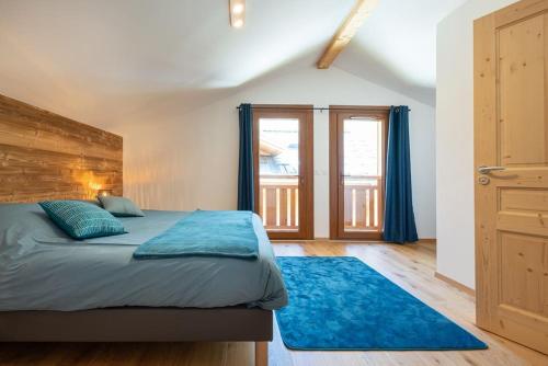 Posteľ alebo postele v izbe v ubytovaní Les 3 Sophies - Magnifique chalet pour 1 à 8 personnes proche des remontées mécaniques des prodains