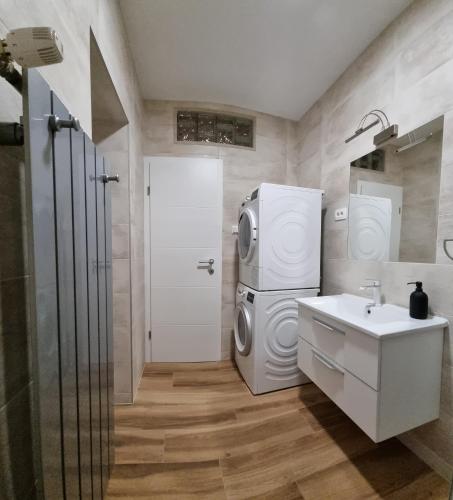 Phòng tắm tại Apartman Orhideja