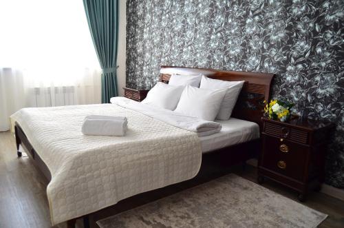 Кровать или кровати в номере Golden Park Hotel