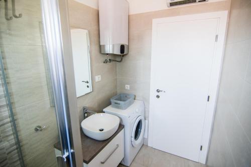 Ένα μπάνιο στο Apartments Up&Up