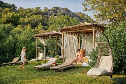 a man and a woman sitting in a gazebo at TUI MAGIC LIFE Sarigerme in Sarigerme