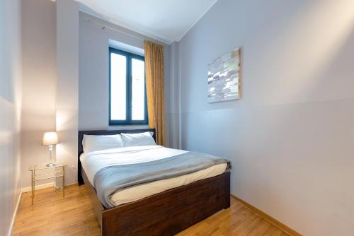 Una cama o camas en una habitación de Milan Retreats Duomo
