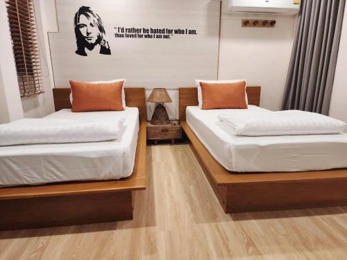 Postel nebo postele na pokoji v ubytování Sleep Walker Poshtel