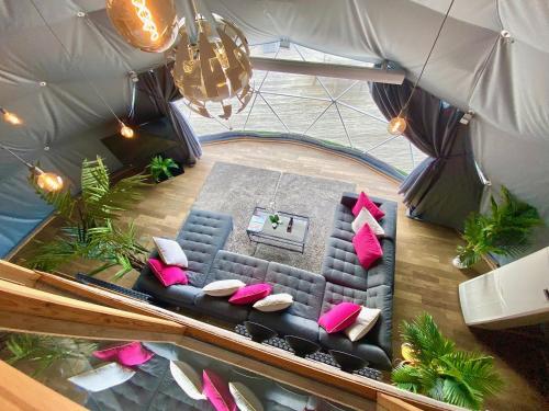 an overhead view of a living room with a couch at Sunridge Geodome with private Hot tub in Plymouth