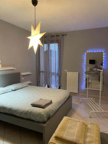 Postel nebo postele na pokoji v ubytování La Casina di Eri