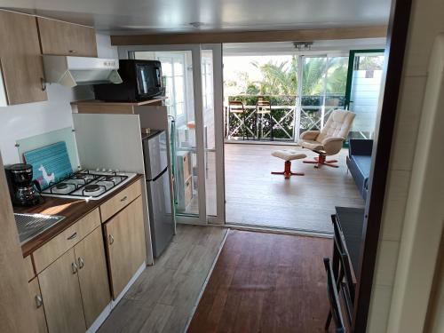 Kjøkken eller kjøkkenkrok på Mobil-home avec vue mer