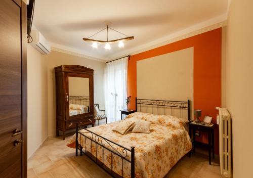 Кровать или кровати в номере B&B La Botte - Taurasi
