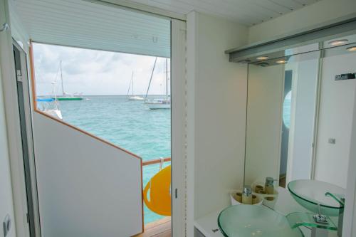 a view of the ocean from the balcony of a yacht at Aqualodge, Les Saintes, Terre de Haut in Terre-de-Haut
