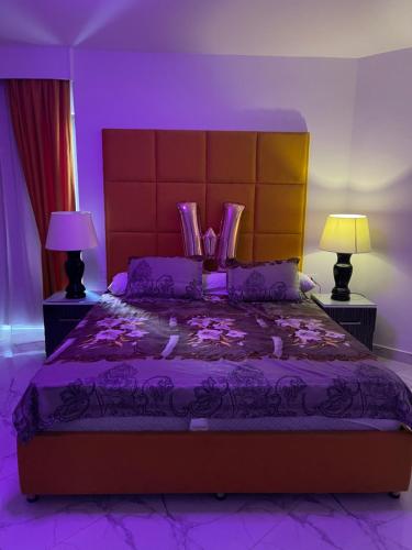En eller flere senge i et værelse på بورتوسعيد Porto said