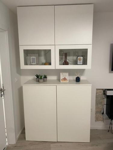 Kuchyň nebo kuchyňský kout v ubytování SUN&MOON Design Studios KRK