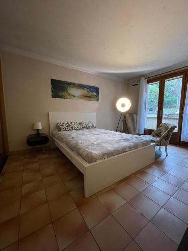 Ein Bett oder Betten in einem Zimmer der Unterkunft Superbe maison calme à Bagneux, Options Clim et Parking, lave-linge