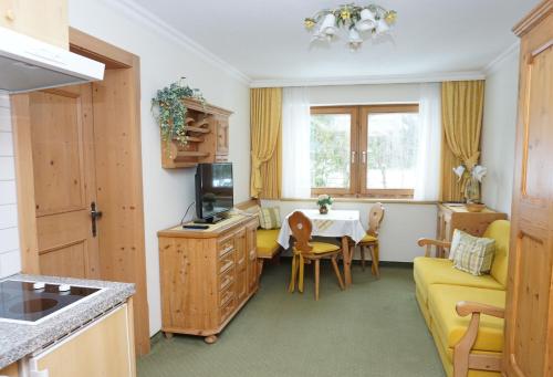Kuchyň nebo kuchyňský kout v ubytování Landhaus Achental