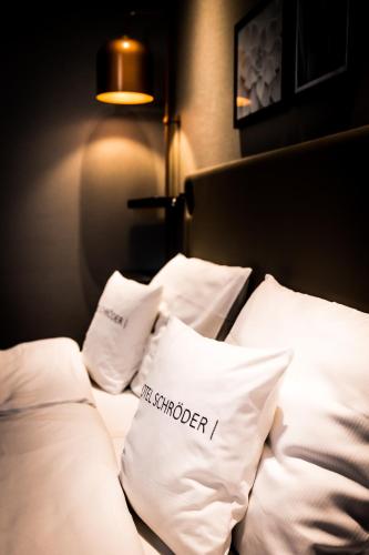 Una cama o camas en una habitación de Hotel & Restaurant Schröder
