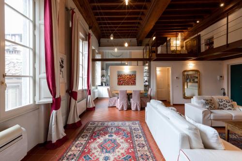 Uma área de estar em Palazzo Orsucci Apartment
