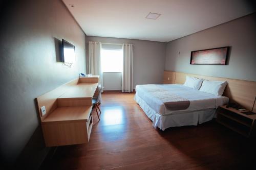 Roma Hotelにあるベッド