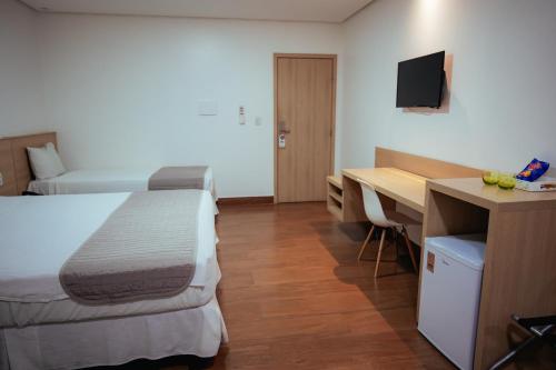 Roma Hotelにあるベッド