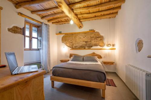 Ένα ή περισσότερα κρεβάτια σε δωμάτιο στο Casa Manuela