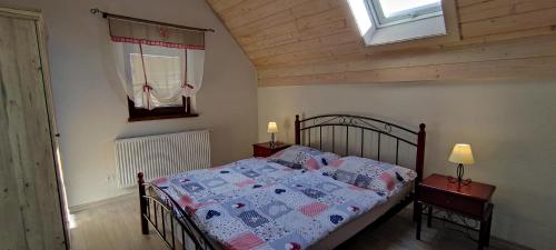 Postel nebo postele na pokoji v ubytování Wellness Chata Tatry