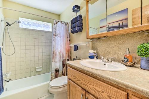 a bathroom with a sink and a toilet and a shower at Pet-Friendly Austin Home with Private Hot Tub! in Austin