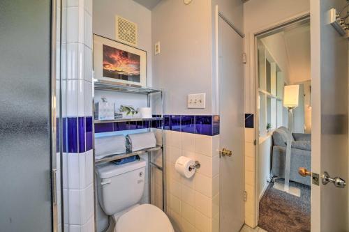 a bathroom with a white toilet in a room at Santa Barbara Studio Near Downtown and Beaches in Santa Barbara