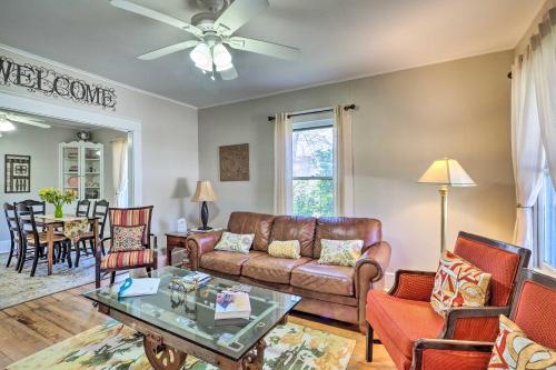a living room with a couch and a table at Georgetown Vacation Rental Close to Town Square! in Georgetown