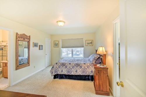 a bedroom with a bed and a window at Pet-Friendly Montana Getaway Near Kayaking! in Missoula
