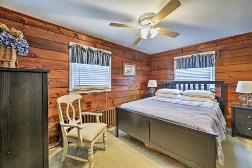 a bedroom with a bed and a ceiling fan at Seaside Park Apt with Outdoor Shower- Walk to Beach! in Seaside Park