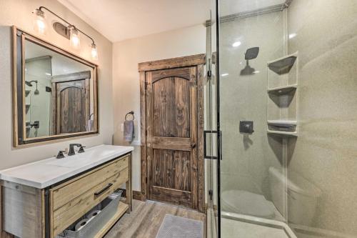 a bathroom with a sink and a shower at Waterfront Nevada Escape with Private Pond and Dock! in Nevada