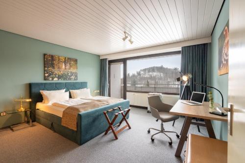 Postel nebo postele na pokoji v ubytování Penthouse Falkennest