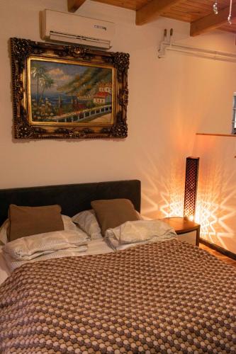 Postel nebo postele na pokoji v ubytování Borostyán Apartmanház