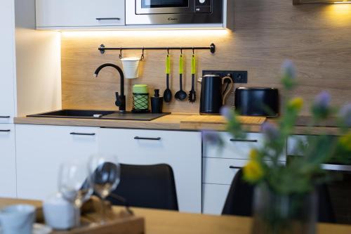 Una cocina o cocineta en Rezidence KUPEC