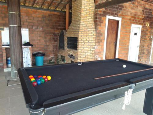 Biliár nebo kulečník v ubytování Casa Aconchegante na Serra de Gravtá