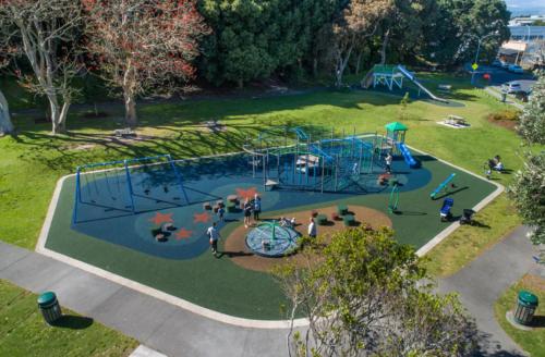 an aerial view of a playground in a park at Sea Breeze 3 bedroom Apartment Mount Maunganui in Mount Maunganui