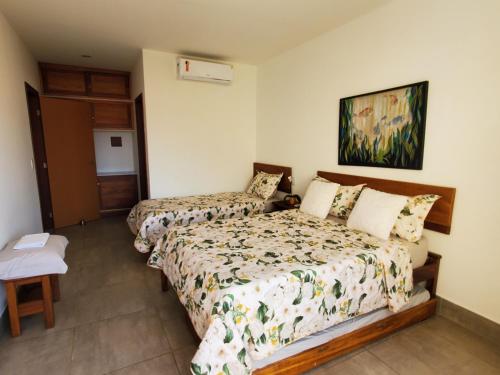 Ένα ή περισσότερα κρεβάτια σε δωμάτιο στο A CASA FORMOSA