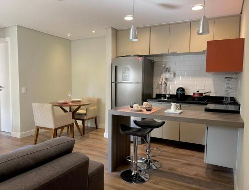 Kitchen o kitchenette sa 415 - Rentaqui - Flat Jardins Residence Confort