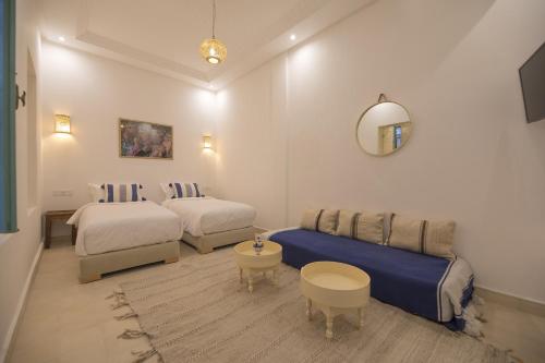Postel nebo postele na pokoji v ubytování Riad l'Esprit des Patios & Spa