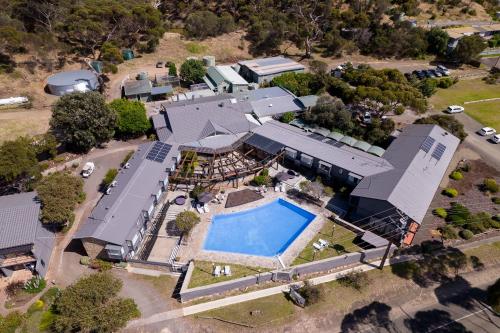 an overhead view of a house with a swimming pool at Mercure Kangaroo Island Lodge in American River