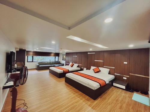Postel nebo postele na pokoji v ubytování DT Hotel Hai Phong