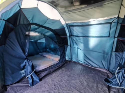 Postel nebo postele na pokoji v ubytování El Nido Beach Camp