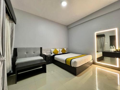 Letto o letti in una camera di Swapnabagh Hotel & Resort