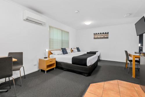 TV a/nebo společenská místnost v ubytování Browns Plains Motor Inn